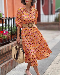 Kleid mit Vintage-Print und Puffärmeln