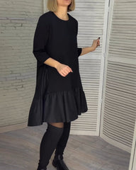 Kleid mit Rundhalsausschnitt und Eleganz