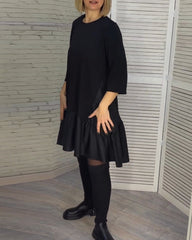 Kleid mit Rundhalsausschnitt und Eleganz